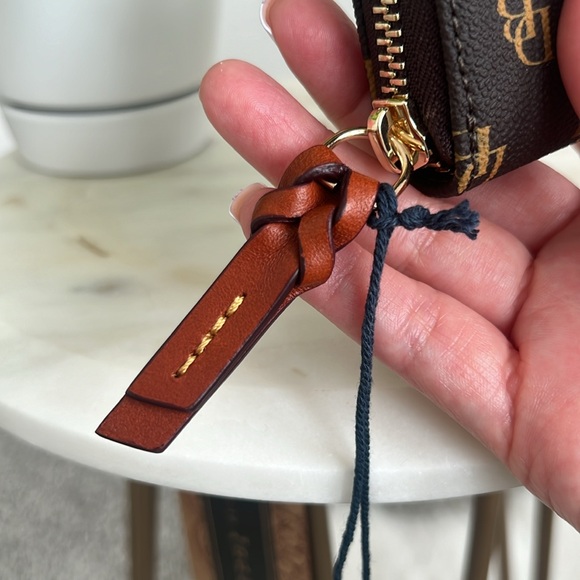 The Dooney & Bourke Greta Large Zip Around Credit Card Case - Picture 11 of 14